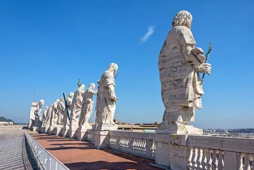 12 apostles statues on the St. Peter's Basilica Facade seen by the Basilica's rooftop